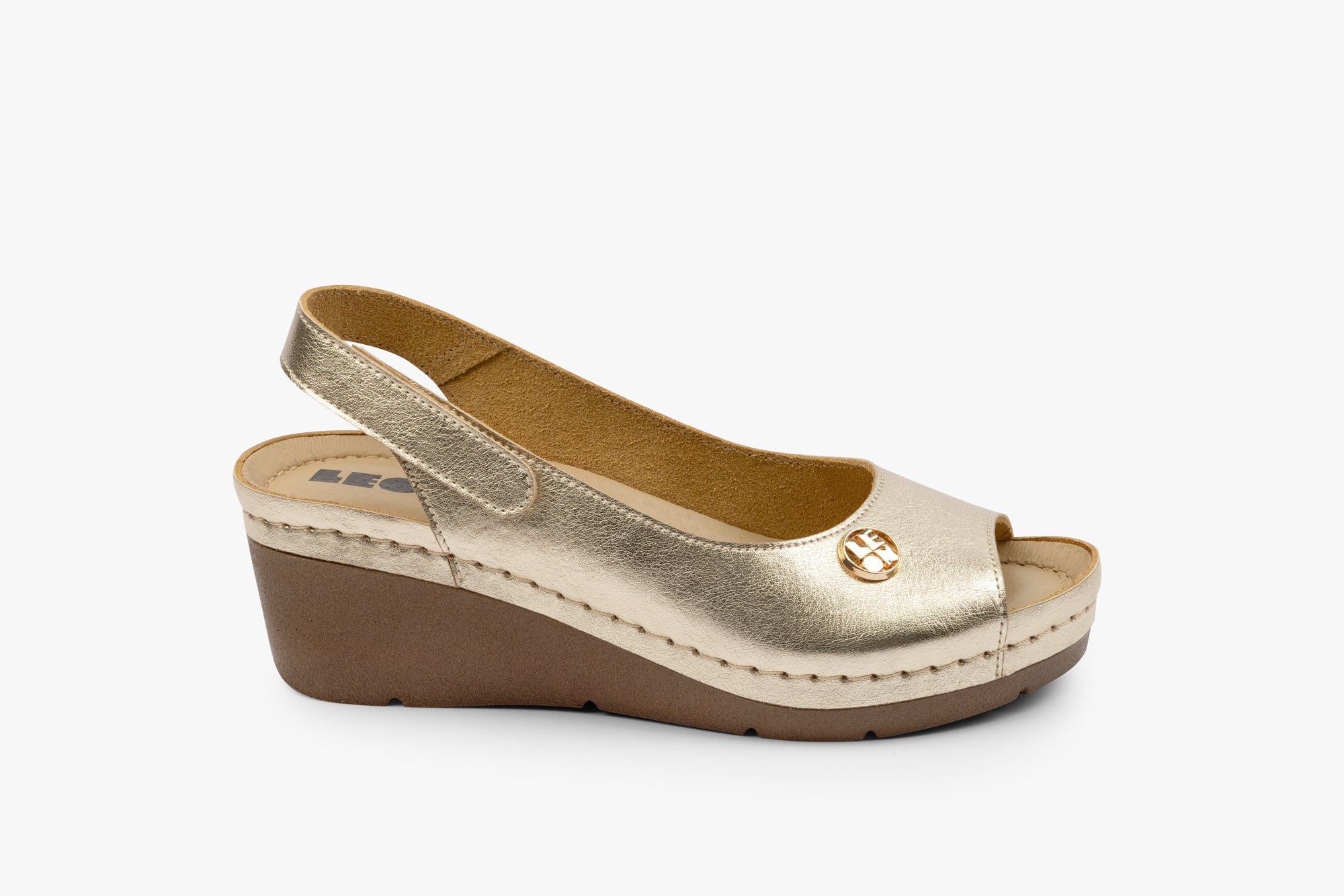 Serene damkilsandal i läder – guld
